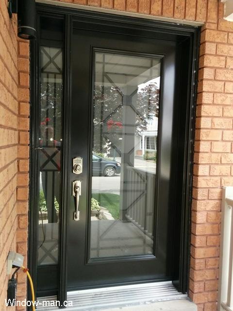 Single front door entry insulated steel with one sidelight. Black. Contemporary Century wrought iron glass inserts